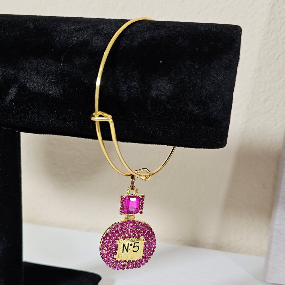 Gold Tone Thin Bracelet with Large Perfume Bottle Charm